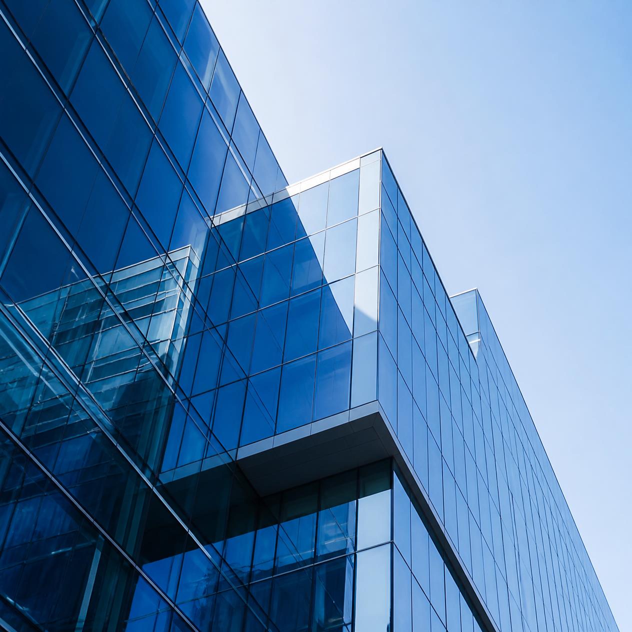 Modern corporate office architecture, symbolizing strategic growth for Alshan Consultants in Sharjah and Mumbai.